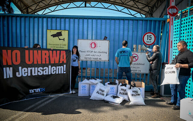 Israelis protest against UNRWA outside its offices in Jerusalem, March 13, 2024. (Arie Leib Abrams/Flash90)