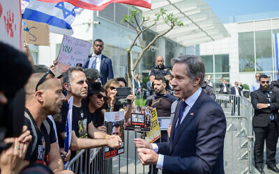 US Secretary of State Antony Blinken (R) meets with the families of the hostages held by Hamas, outside of a hotel, in Tel Aviv, on May 1, 2024.  (Photo by Avshalom Sassoni/Flash90)