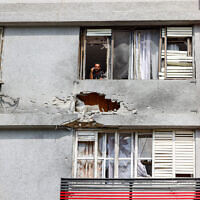 A damaged home following a rocket attack in the northern city of Kiryat Shmona, May 5, 2024. (David Cohen/Flash90)