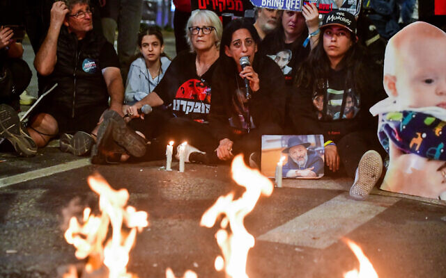 Demonstrators protest calling for the release of Israeli hostages held in the Gaza Strip outside Hakirya Base in Tel Aviv, May 8, 2024. (Avshalom Sassoni/Flash90)