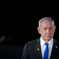 Prime Minister Benjamin Netanyahu attends a Memorial Day ceremony for Israel's fallen soldiers and victims of terror, at the Knesset in Jerusalem, May 12, 2024. (Yonatan Sindel/Flash90)