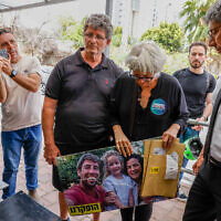 Gadi and Reuma Kedem, who lost several of their family members during the October 7 massacre, arrive to file a complaint at a police station after being attacked during a demonstration in Tel Aviv, May 19, 2024. (Flash90)