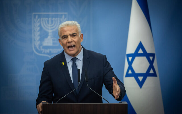 Opposition Leader Yair Lapid leads a meeting of his Yesh Atid party at the Knesset in Jerusalem, on May 20, 2024. (Yonatan Sindel/Flash90)