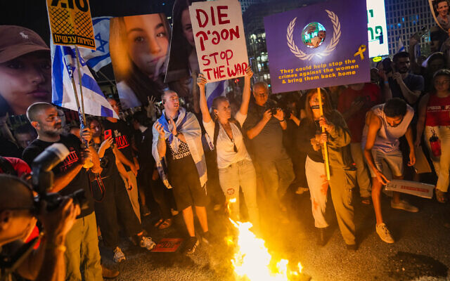 Protesters call for the release of hostages held by Hamas in Gaza since October 7, outside the Defense Ministry Headquarters in Tel Aviv, May 25, 2024. (Erik Marmor/Flash90)