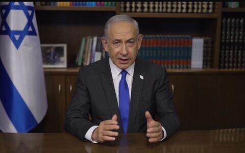 Prime Minister Benjamin Netanyahu speaks in a video message from his office, May 7, 2024. (Screenshot/GPO)