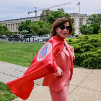 Rep. Kathy Manning (D-NC) poses for a photo in her cape given to her by MomsRising at the Mother's Day Press Conference calling for action on Care and Reproductive rights on May 8, 2024 in Washington. (Photo by Jemal Countess/Getty Images for MomsRising, via JTA)