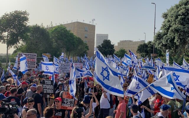 Protesters gather outside the Knesset in Jerusalem for an anti-government rally on May 20, 2024. (Charlie Summers/Times of Israel)