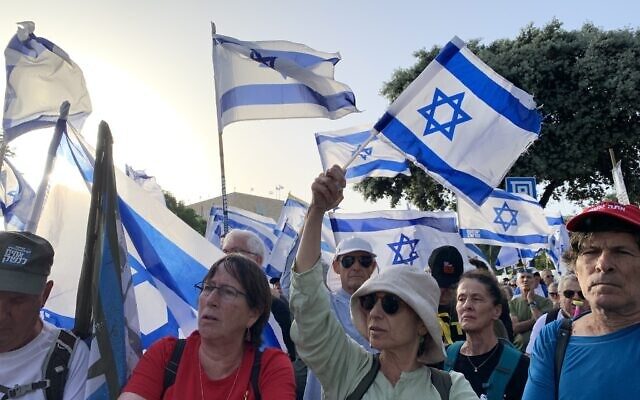 Protesters gather outside Knesset for an anti-government rally on May 20, 2024. (Charlie Summers/Times of Israel)