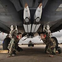Illustrative: US airmen perform a final check of the stowed twin wings on four ground-training Guided Bomb Unit-39 small-diameter bombs loaded on an F-15E Strike Eagle at Royal Air Force Lakenheath, England, on Aug. 1, 2006 (US Air Force photo/Master Sgt. Lance Cheung) .