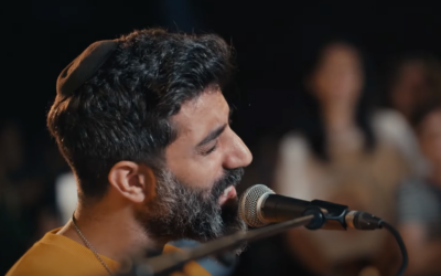 Musician Orian Shukron sings 'My Sunny Son,' the song he wrote in April 2024 about hostage Omer Shem-Tov (Screenshot)