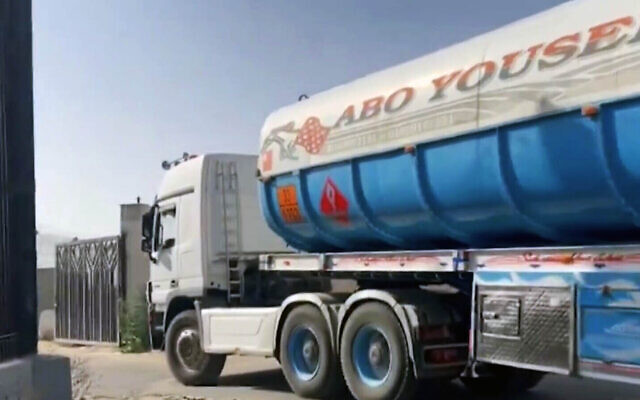 Screen capture from video of Egyptian aid trucks entering the Gaza Strip via the Kerem Shalom Crossing, May 26, 2024. (X. Used in accordance with Clause 27a of the Copyright Law)