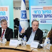 From left to right: Education Minister Yoav Kisch, Shapira committee head Amos Shapira, and Tammy Omanski, head of the Education Ministry's special education department, at a press conference in Jerusalem, on May 28, 2024. (Sivan Shachar/courtesy)