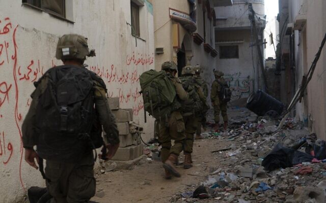 IDF troops operate in the Gaza City neighborhood of Zeitoun, in a handout image released May 11, 2024. (Israel Defense Forces)