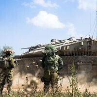 Troops of the 460th Armored Brigade operate in northern Gaza's Jabaliya, in a handout photo published May 13, 2024. (Israel Defense Forces)