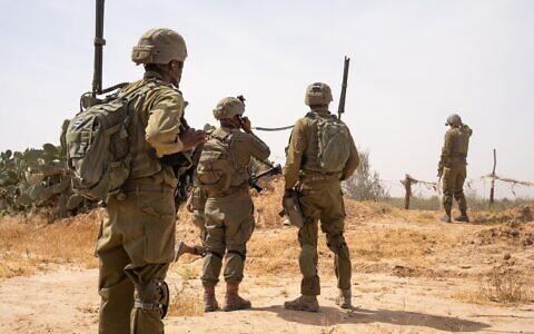 IDF troops operate in the central Gaza corridor, in a handout image published May 1, 2024. (Israel Defense Forces)