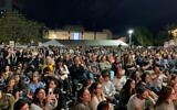 Crowd of thousands gathers in Tel Aviv's Hostages Square to hear testimonies from Holocaust survivors and hostage families on May 5, 2024, the eve of Holocaust Remembrance Day. (Charlie Summers/Times of Israel)