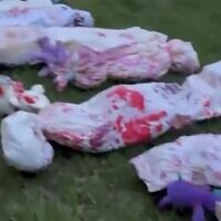 Fake bloody corpses left by pro-Palestinian, anti-Israel activists outside the home of University of Michigan board chair Sarah Hubbard on May 15, 2024, in video circulated on social media (Used in accordance with Clause 27a of the Copyright Law)