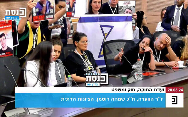 Einav Zangauker (second right), whose son Matan is held hostage in Gaza, argues with Likud MK Tally Gotliv (left) at the Knesset's Constitution, Law and Justice Committee, in Jerusalem, May 20, 2024. (KnessetTV screenshot: used in accordance with Clause 27a of the Copyright Law)