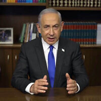 Prime Minister Benjamin Netanyahu speaks in a video message from his office, May 7, 2024. (Screenshot/GPO)