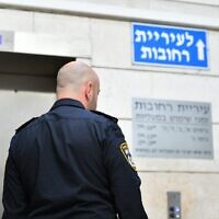 A police officer at the Rehovot municipality, June 4, 2024. (Israel Police)