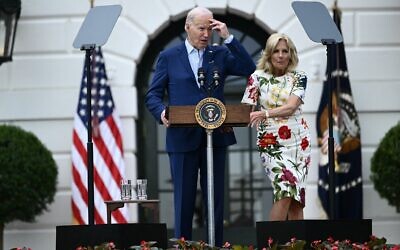 US President Joe Biden speaks next to First Lady Jill Biden during the annual Congressional picnic at the White House in Washington, DC, on June 4, 2024. (Brendan SMIALOWSKI / AFP)