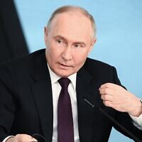 Russia's President Vladimir Putin speaks with heads of International news agencies in Saint Petersburg on June 5, 2024. -  (Vladimir ASTAPKOVICH / POOL / AFP)