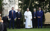 Pope Francis (center) poses for a photo with Raphael Schutz, the Israeli ambassador to the Holy See (first from left), Rabbi Abramo Alberto Funaro (second from left), Redouane Abdellah of Rome's Islamic Center (second from right) and Issa Kassissieh, the Palestinian Authority's ambassador to the Holy See (first from right) after an evening of peace prayers in the Vatican Gardens, at the Vatican, June 7, 2024. (Alessandra Tarantino / POOL / AFP)