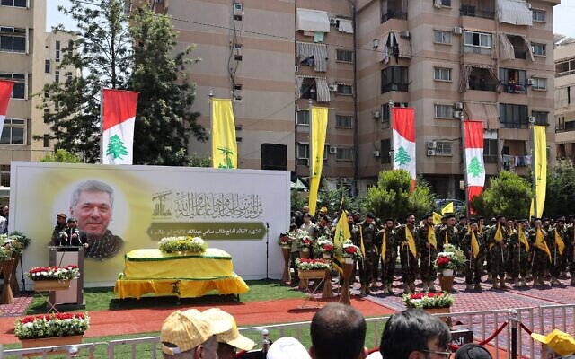 A speech made near the coffin of Taleb Abdullah, known as Abu Taleb, a senior field commander of the Hezbollah terror group who was killed in an Israeli strike, during his funeral in Beirut's southern suburbs on June 12, 2024. (Photo by ANWAR AMRO / AFP)