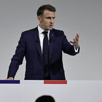 France's President Emmanuel Macron delivers remarks during a press conference held at the Pavillon Cambon Capucines in Paris, June 12, 2024. (Stephane de Sakutin / AFP)