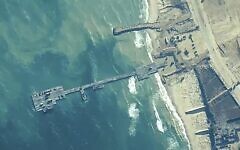 FILE - The image provided by US Central Command shows American and Israeli forces placing the Trident Pier on the coast of Gaza Strip on May 16, 2024. (US Central Command via AP)