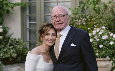 This image provided by News Corp. shows Rupert Murdoch and Elena Zhukova posing for a photo, June 1, 2024 during their wedding ceremony at his vineyard estate in Bel Air, California (News Corp.  via AP)