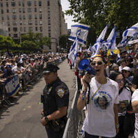 Participants march during the annual Israel Day Parade on Fifth Avenue on Sunday, June 2, 2024, in New York. (AP Photo/Yuki Iwamura)
