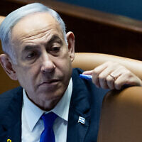 Prime Minister Benjamin Netanyahu attends a Knesset plenum session in Jerusalem on May 27, 2024. (Yonatan Sindel/Flash90)