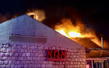 Israeli firefighters try to extinguish a fire at the Ima restaurant in Jerusalem, June 6, 2024. (Dor Pazuelo/Flash90)