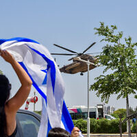 An Israeli military helicopter with released Israeli hostages arrives at Sheba Medical Center in Ramat Gan, June 8, 2024 (Avshalom Sassoni/Flash90)