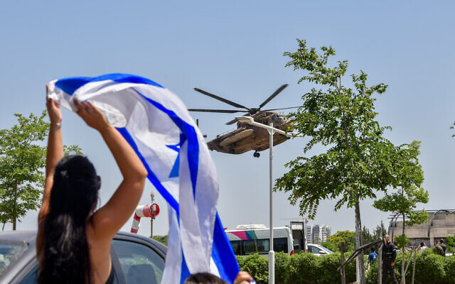 An Israeli military helicopter with released Israeli hostages arrives at Sheba Medical Center in Ramat Gan, June 8, 2024 (Avshalom Sassoni/Flash90)