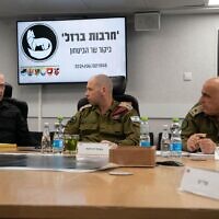 Defense Minister Yoav Gallant (left) meets with IDF Southern Command chief, Maj. Gen. Yaron Finkelman (center), at the unit's HQ in Beersheba, June 2, 2024. (Ariel Hermoni/Defense Ministry)
