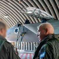 Defense Minister Yoav Gallant (right) is seen boarding a two-seater F-15 fighter jet at the Tel Nof Airbase in central Israel, June 5, 2024. (Ariel Hermoni/Defense Ministry)