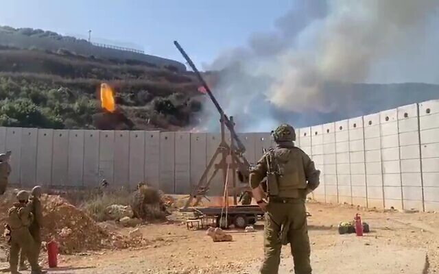 IDF troops use a trebuchet to launch an incendiary device over the border into Lebanon, in a video circulated on June 13, 2024. (Screenshot)